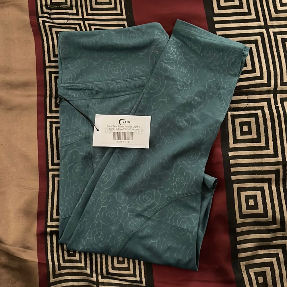 Dark teal floral picket light and tight hi rise 7/8